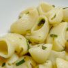 conchiglie 100x100 Petti di pollo con arancia e salvia